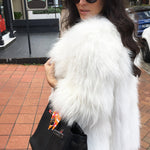 Exotique Long Fur Coat in Snow - Mode & Affaire